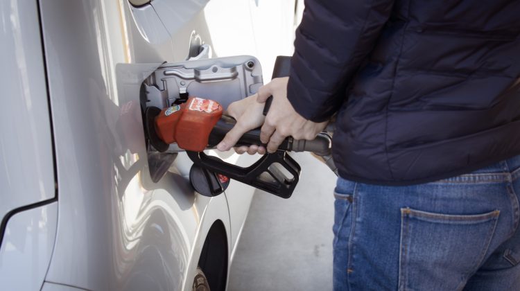Filling up gas tank of car