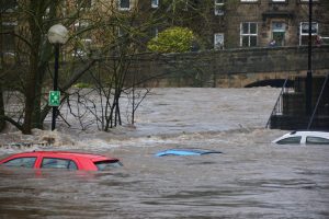 Cars submerged underwater during flash flood