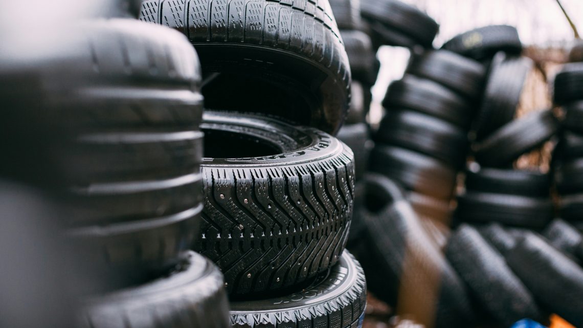 stacks of car tires in an open space