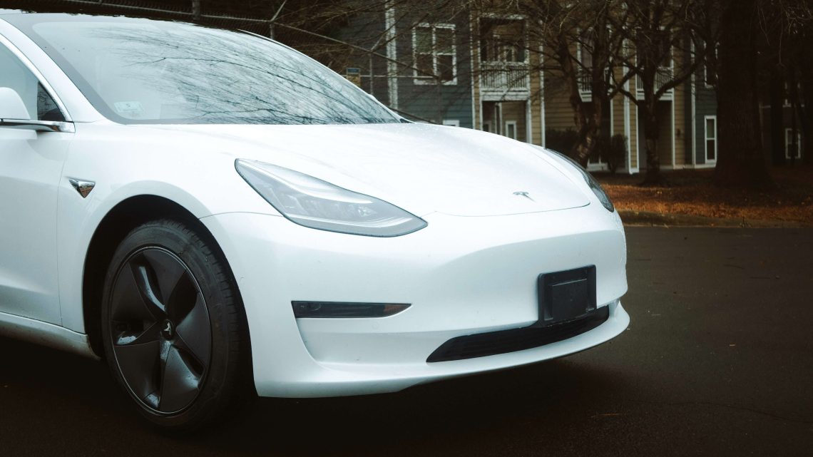 Parked White Tesla SUV